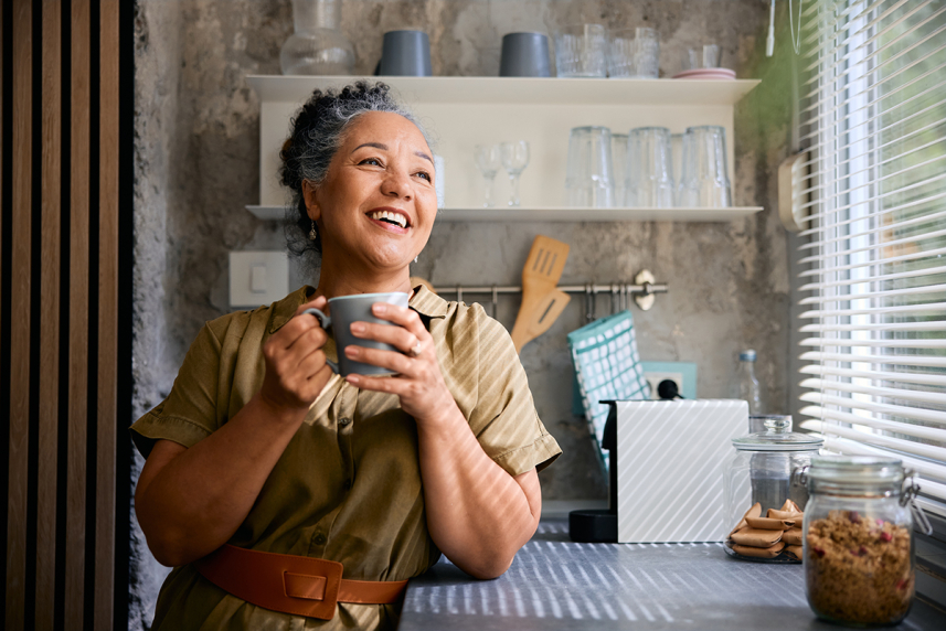 A woman holding a mug.