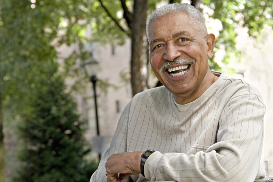 A man smiling outside
