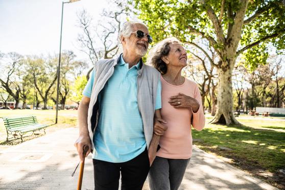 A couple on a walk in a park