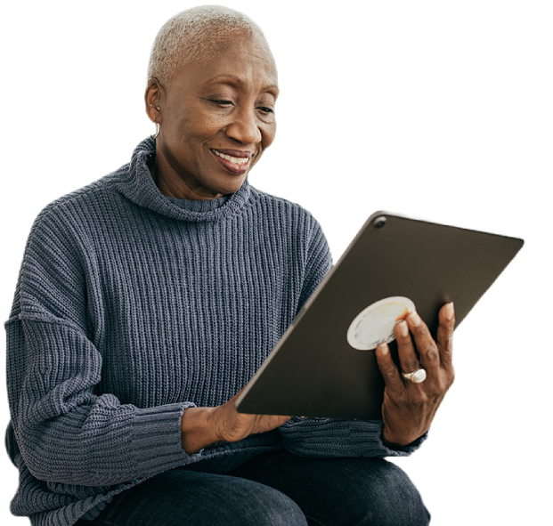 A women reviewing her healthcare plan on a tablet