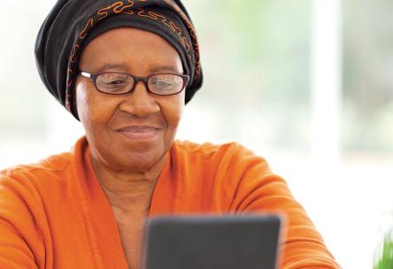 A woman looking at a tablet