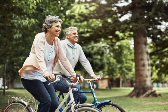 Man and woman riding bikes together