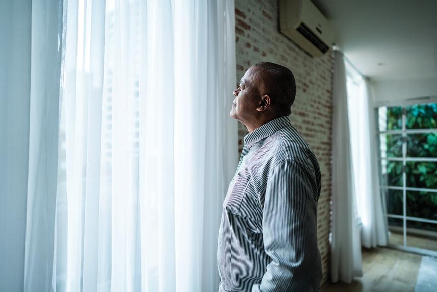 A man looking out of the window.