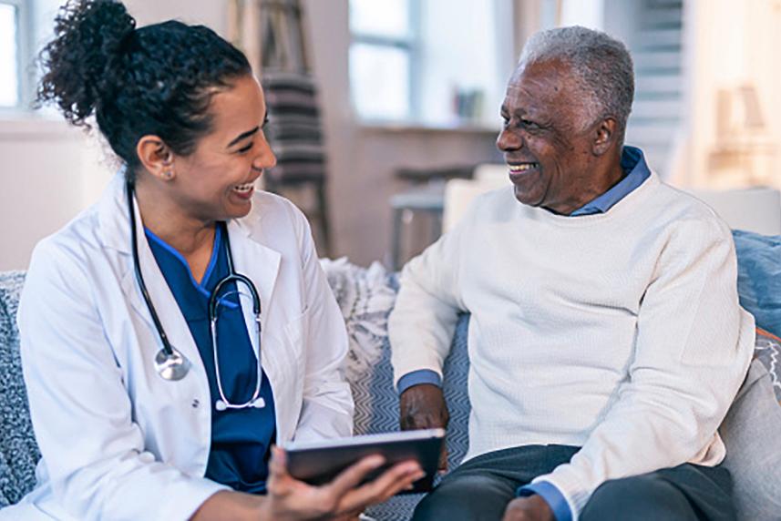 A doctor speaking with a patient.