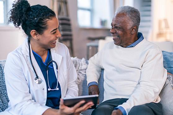 A doctor speaking with a patient.